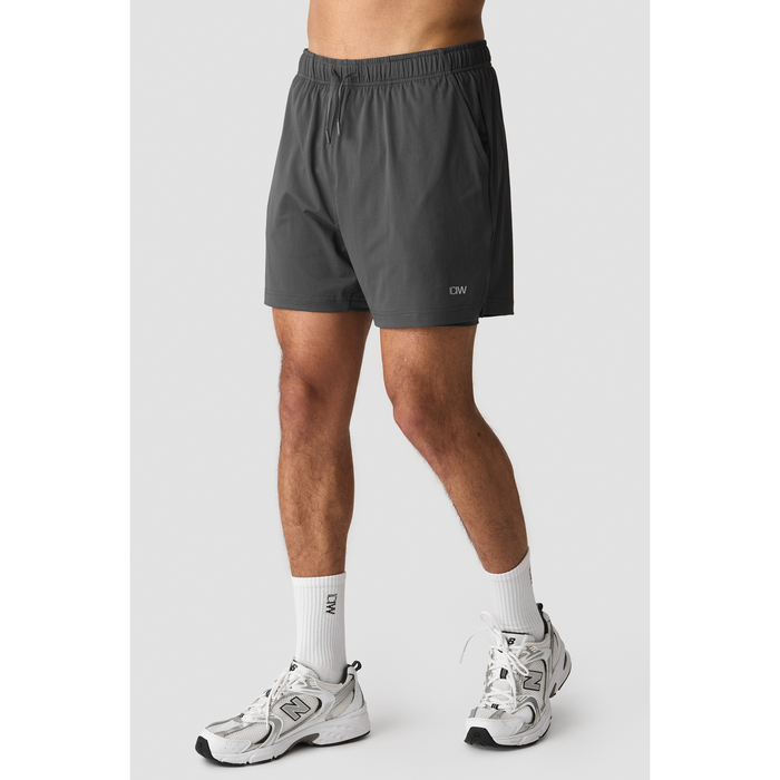 Stride 2 i 1 Shorts Grå